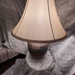 Vintage Boho Style Lamp Features Brown Ceramic Base Hand carved Circle Pattern With Green Patina