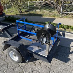 Trailer with 50 gallon water tank hose reel