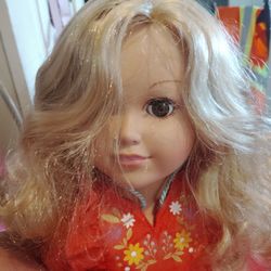 Doll with backpack