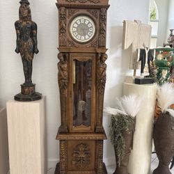 Magnificent Grandfather Clock. All Hand Carved.  Beautiful! Chimed Quarterly.  Now Needs Adjusting Because S Hook Opened. 