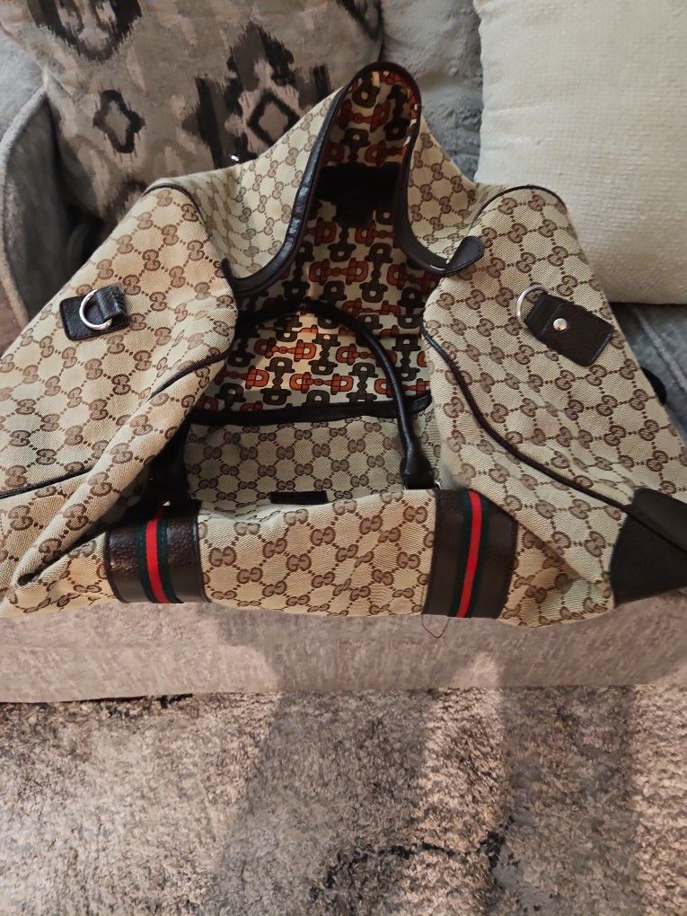 Used Gucci Duffle Bag and Duffle Bag Cover.