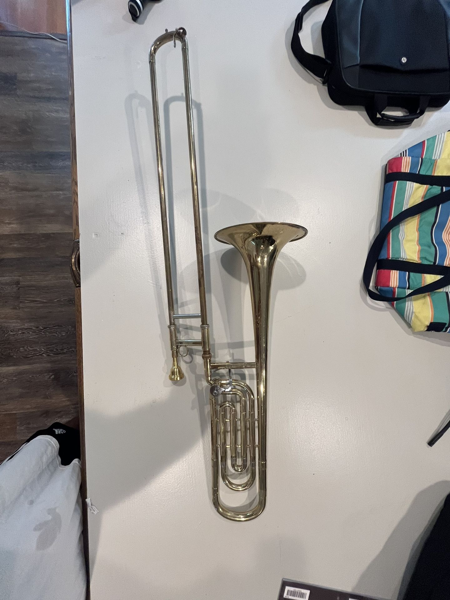 Old‘s ambassador brass trombone Fullerton California new mouthpiece vintage no case. I do not play. This instrument bought it at an estate sale
