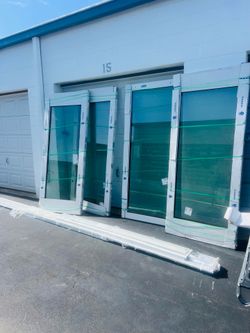 PGT Hurricane Impact Sliding Pocket Door With Frame/Hardware 140.25x95