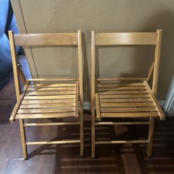 Set of 2 wooden folding chairs. Good Condition