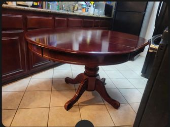 Round Cherry Wood Pedestal Dining Table
