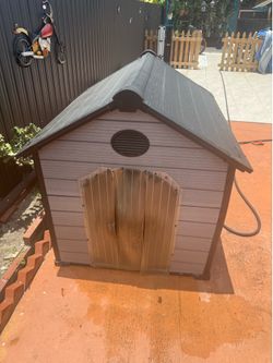 Plastic outdoor dog house