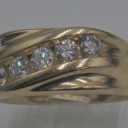 14kt yellow gold ring 9.6 grams w 5 diamonds 1 carat total ,SI1 clarity , G color.  size 10. 874332-1. very good condition. 