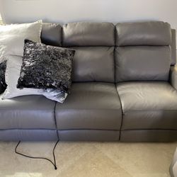 Two Leather Reclining Couches