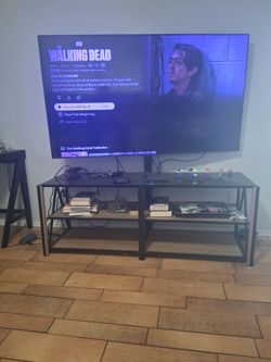65 inch Samsung TV with 3 in 1 mount TV Stand with Shelves