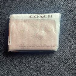 Brand New Pink Wristlet ( Coach ) Never Opened And Never Worn 