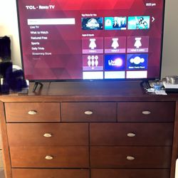 Beautiful well-made, brown dresser, nine drawers