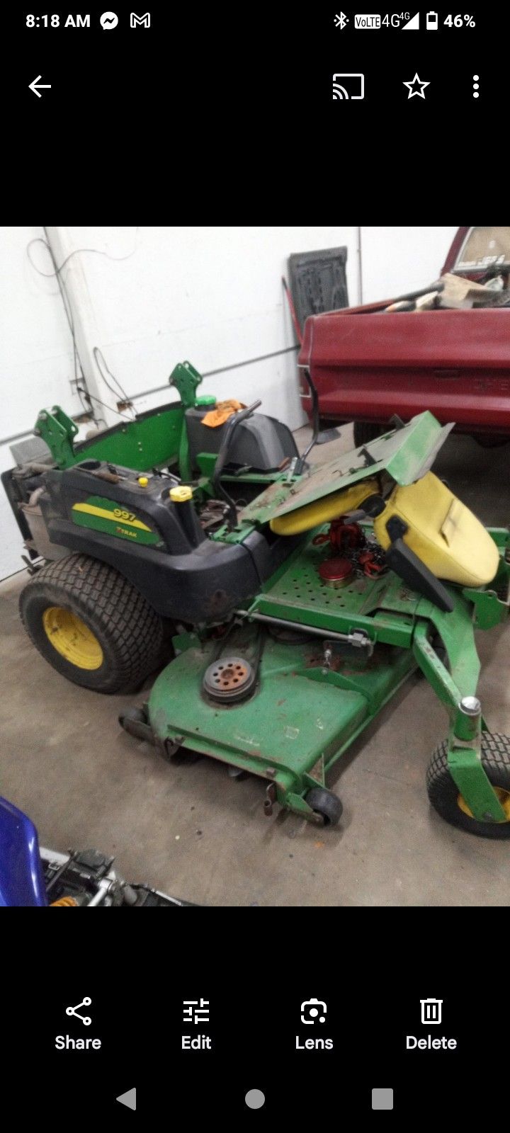 2012 John Deere Zero-turn Mower With Leaf Collector Attachment.