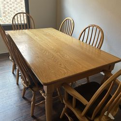 Solid oak kitchen table with six chairs