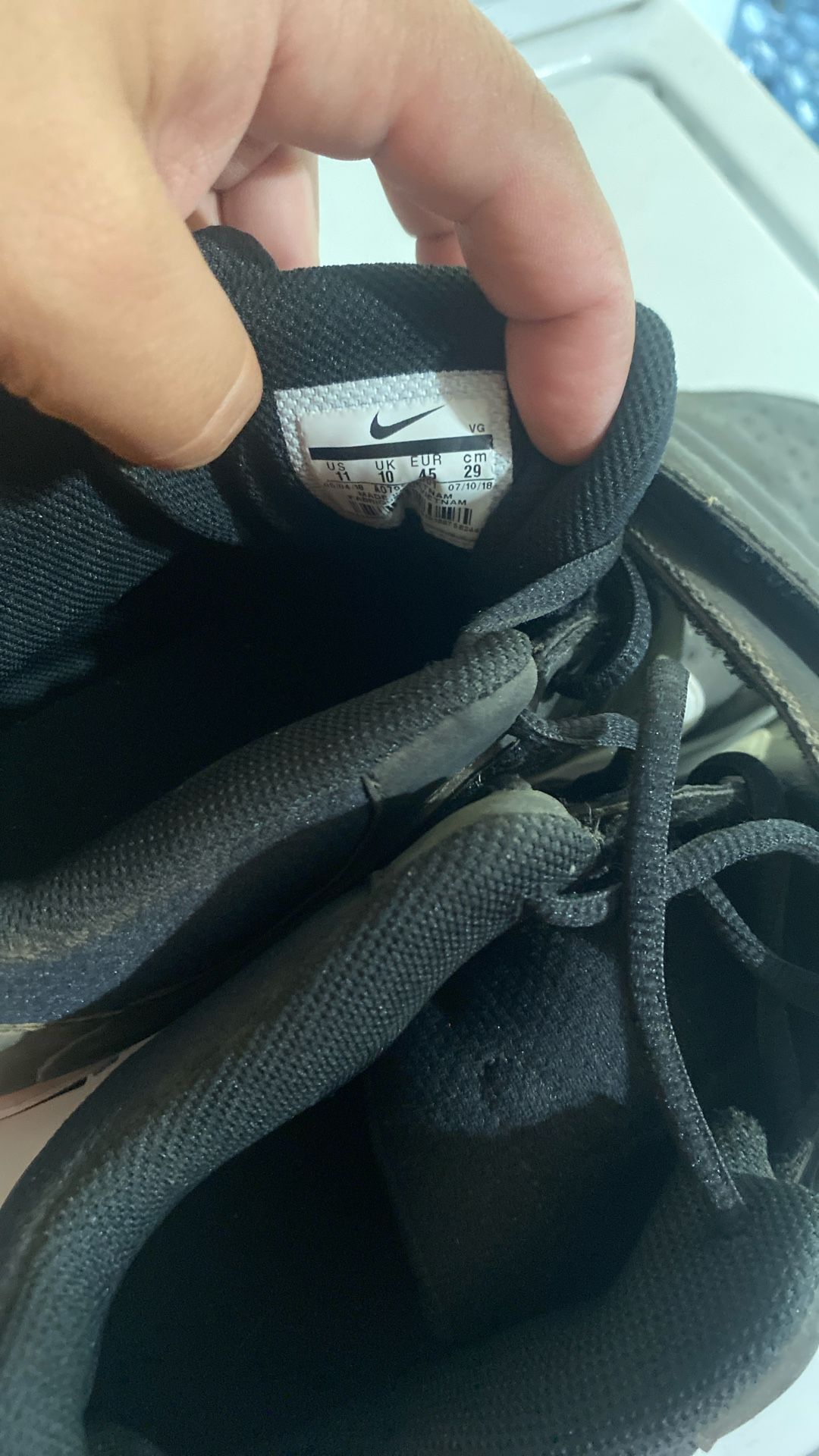 White Football And Black Baseball Cleats 