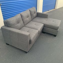 Gray Tufted Reversible Sectional Sofa