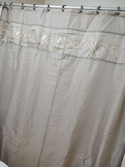 Shower curtain and the floor mats