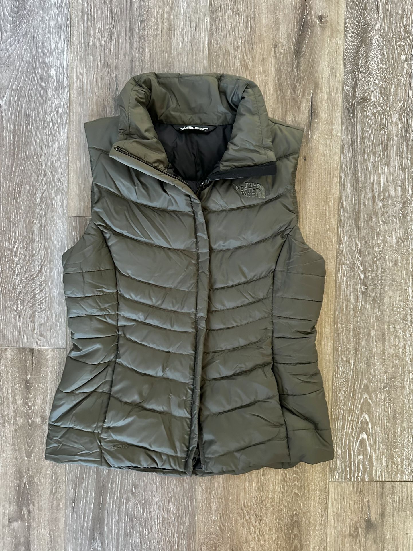 Woman’s Army Green North Face Puffer Vest Size Small (new)