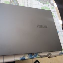 Asus Zenbook Q415M Laptop With Password Lock Has Hairline Crack On Screen Charging And Working Perfect Selling Cheap For Pat's Only