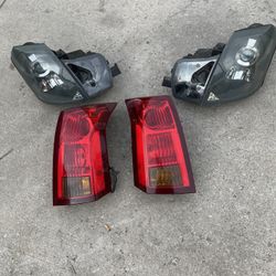 03 To 06 Cadillac Cts Head Lights Tail Lights And Pearl White License Plate Holder And Third Light 