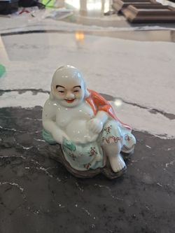 Ceramic smiling Budda