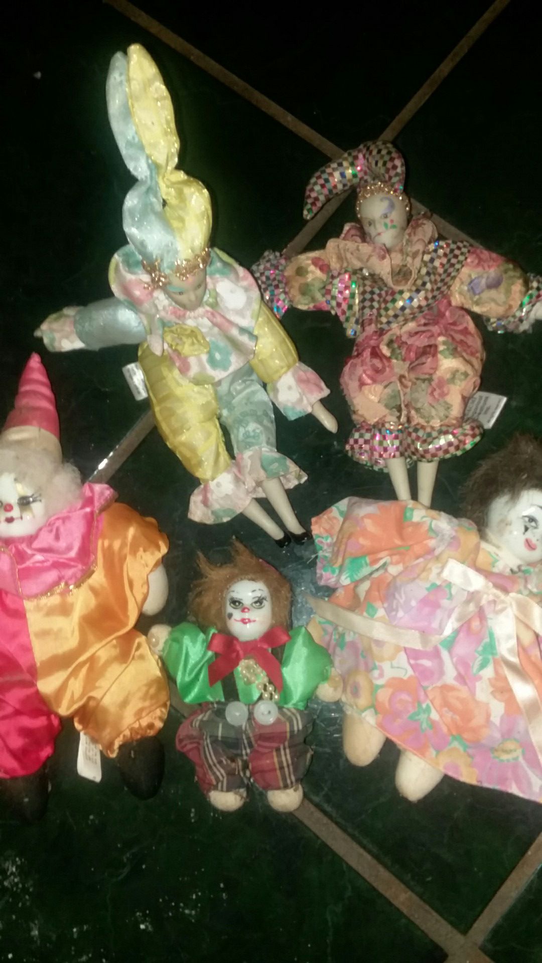 Antique clown and jester dolls