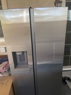 Samsung stainless steel counter depth side-by-side refrigerator. Pickup only. Cross streets 59th Ave. and Peoria.