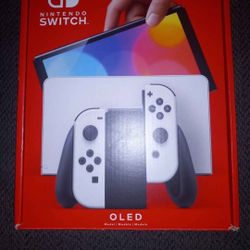 LIKE NEW NINTENDO SWITCH OLED IN BOX