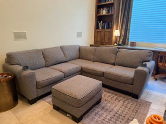 Gray couches with ottoman