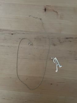 10k gold necklace and charm