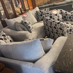 Brand new three piece living room group for $1400. Hurry limited quantities.