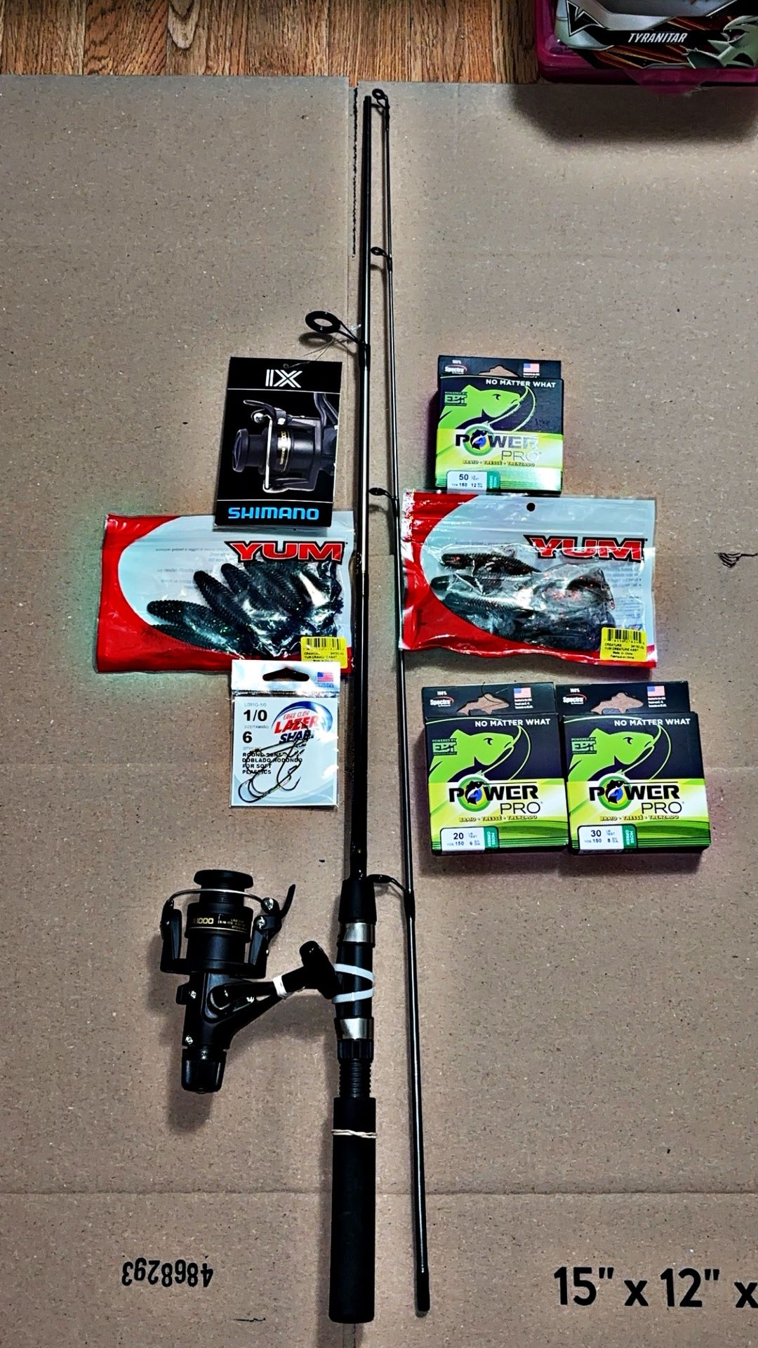 Shimano pool and real three boxes of power pro one bag of hooks and two bags of plastics $135 retail value