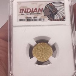 INDIAN COIN IN PROTECTIVE PLASTIC