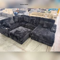 Black corduroy modular sectional sofa with ottoman 