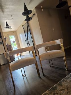 Upholstered arm chairs