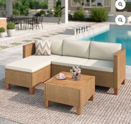 Brand new Rattan patio lounge chair set with table and cushions