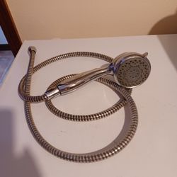Delta AdjustabeMassage Shower Head On 5.5 Foot Hose