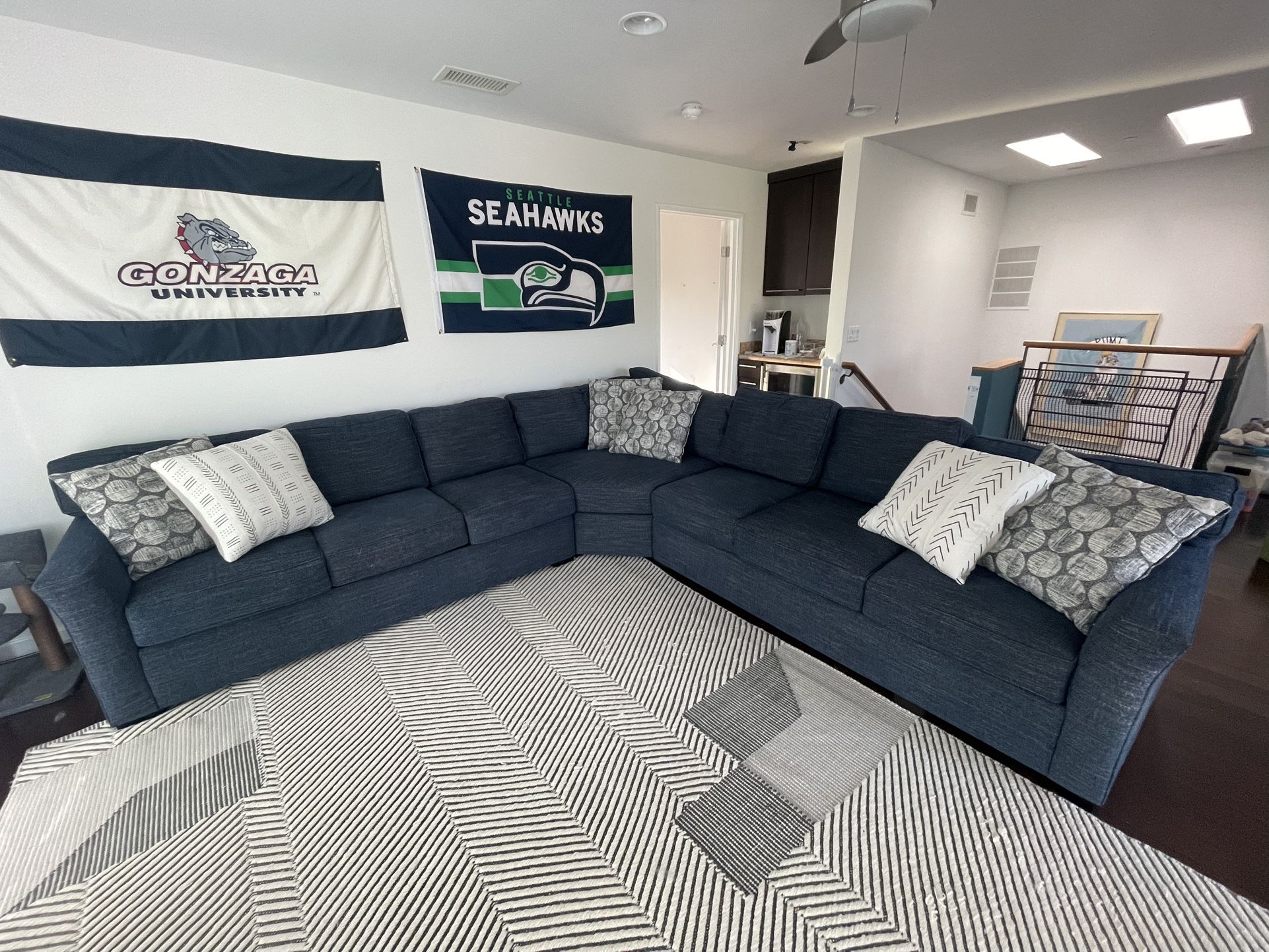 Living Spaces Sectional With Fold Out Bed 
