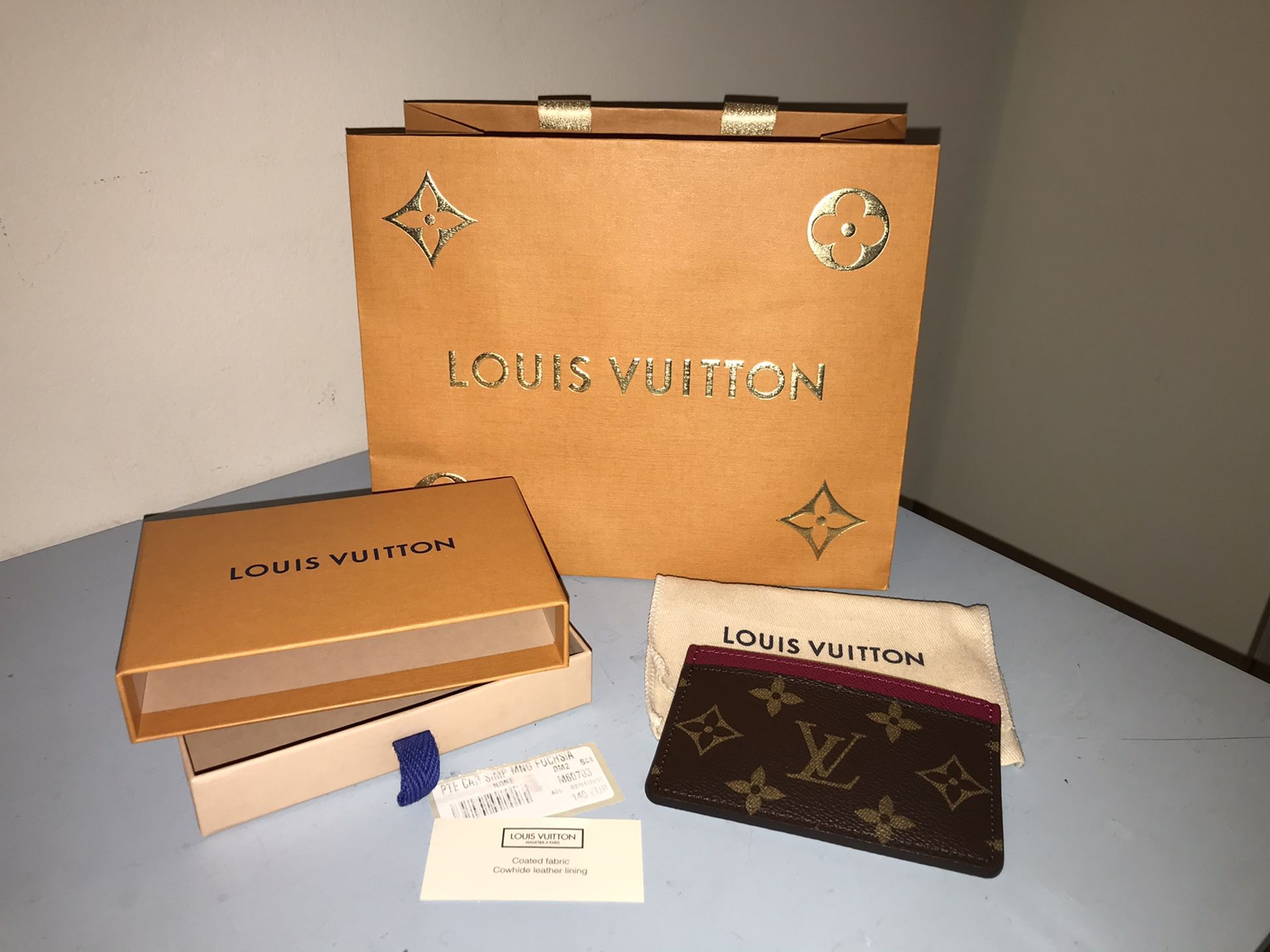 Brand new authentic Louis Vuitton Monogram Fuchsia card holder