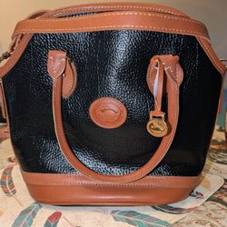  Vintage Dooney & Bourke All-Weather Leather Norfolk bag in black with British tan trim. 