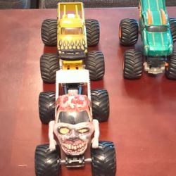 Monster truck large well loved! Still work great though. You can barely tell most of the damage