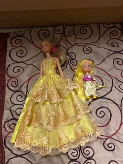 Barbie doll and toddler princesses