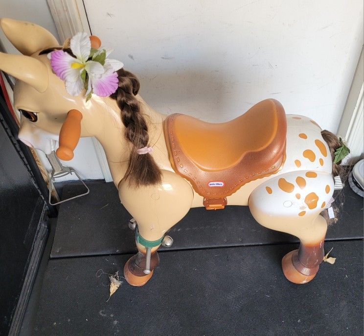 Classic  Child's "Riding " Pony (It actually moves when the child moves on the saddle)