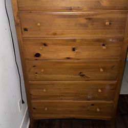 Used Solid Wood 5-Drawer Dresser In FAIR condition.