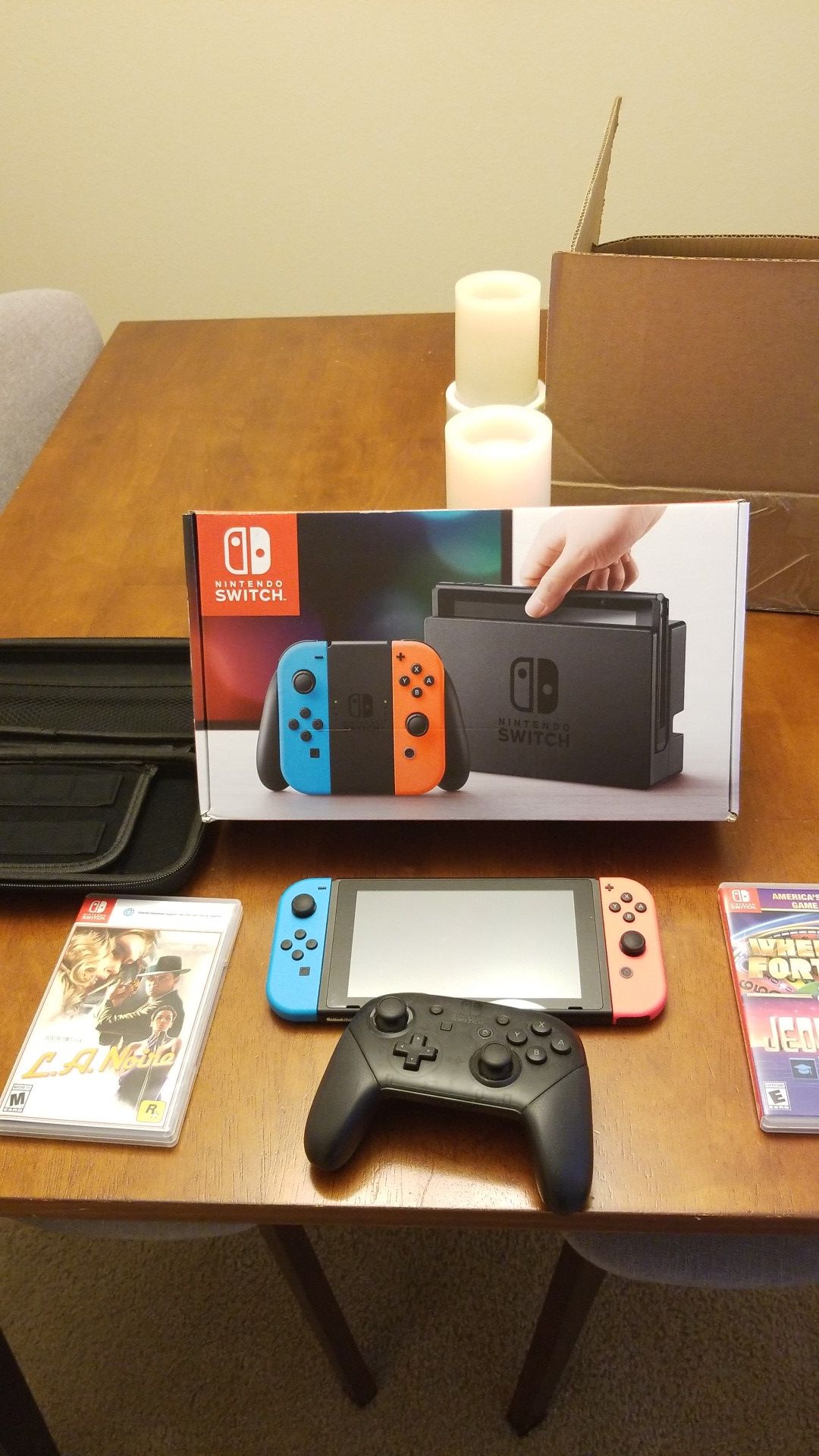 Nintendo Switch with 2 games, PRO Controller & Carrying Case