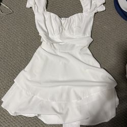 White Dress With Ribbon Tied To Back 