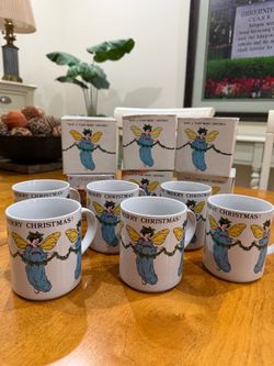 6 Christmas Mugs - Set. RNo chips or cracks. Like new. Had boxes to store them safely.