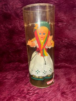 vintage German Trachtenpuppe (traditional folklore souvenir doll) made by the brand Schneider, depicting a young girl dressed in a regional folk costu