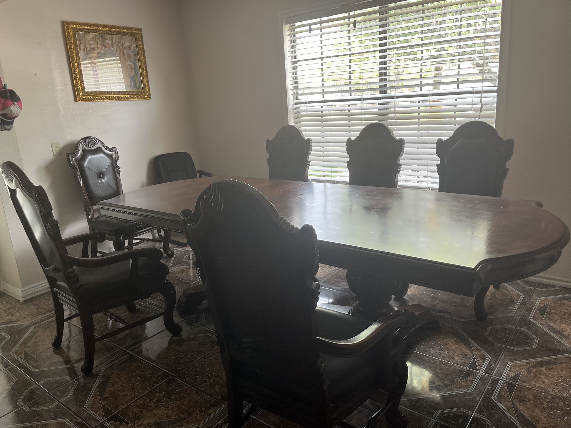 Wooden dining table with chairs