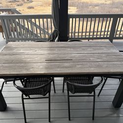 Reclaimed barn wood patio table with chairs