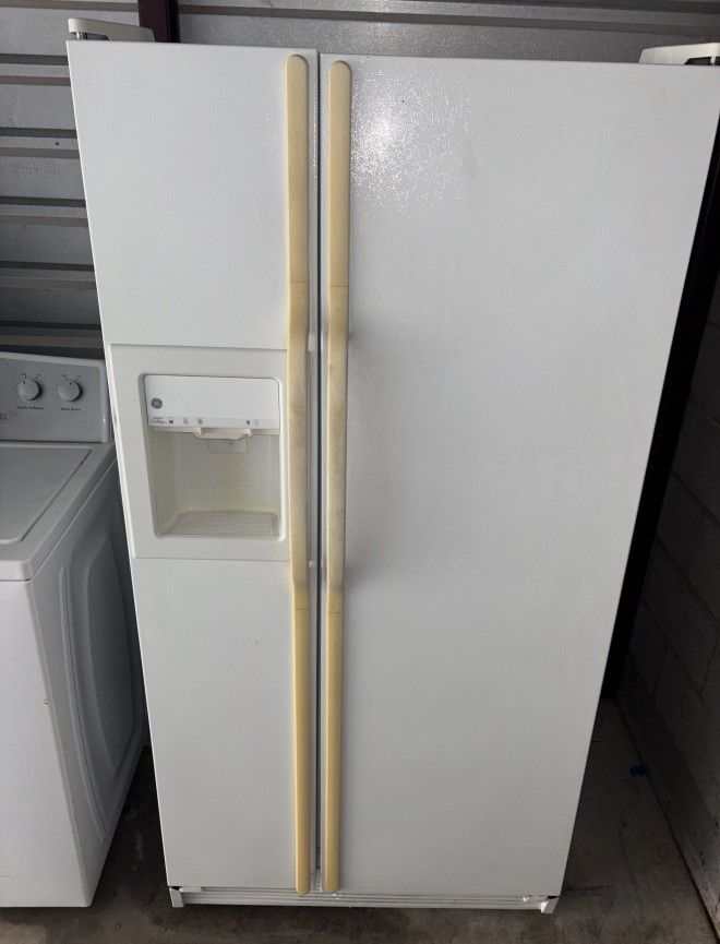 White GE Refrigerator And Freezer